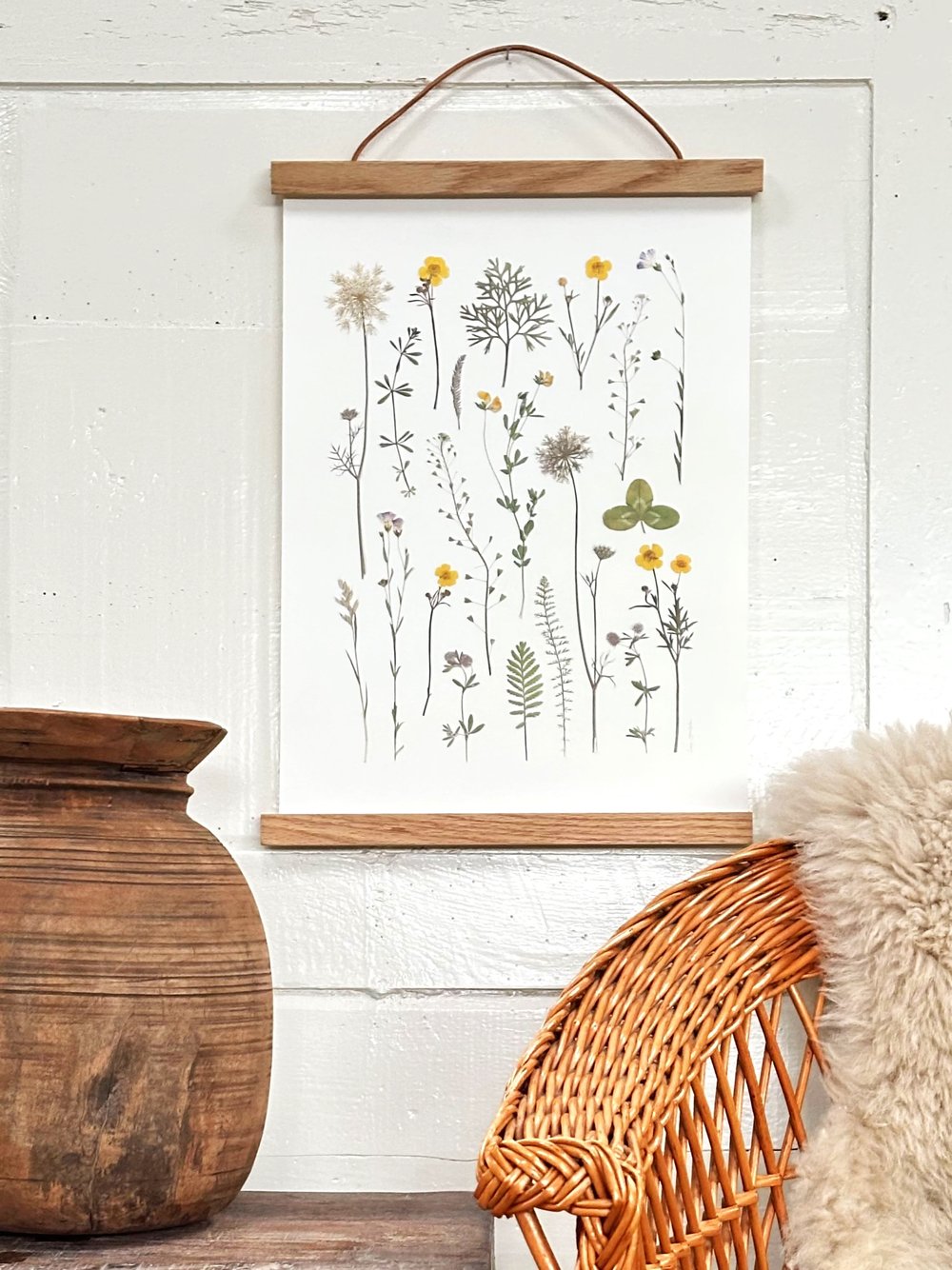 Plakat med hvid baggrund og blomster