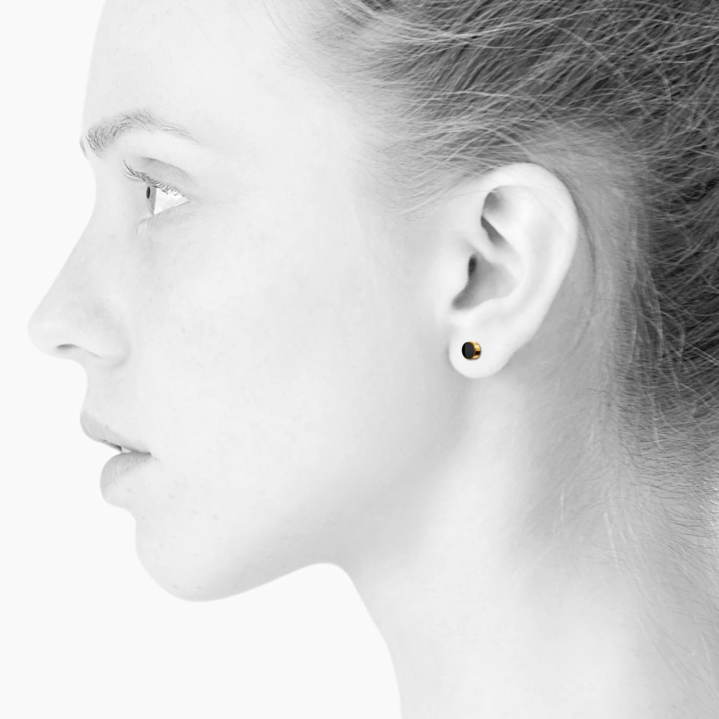 Guld ørestikker med sort